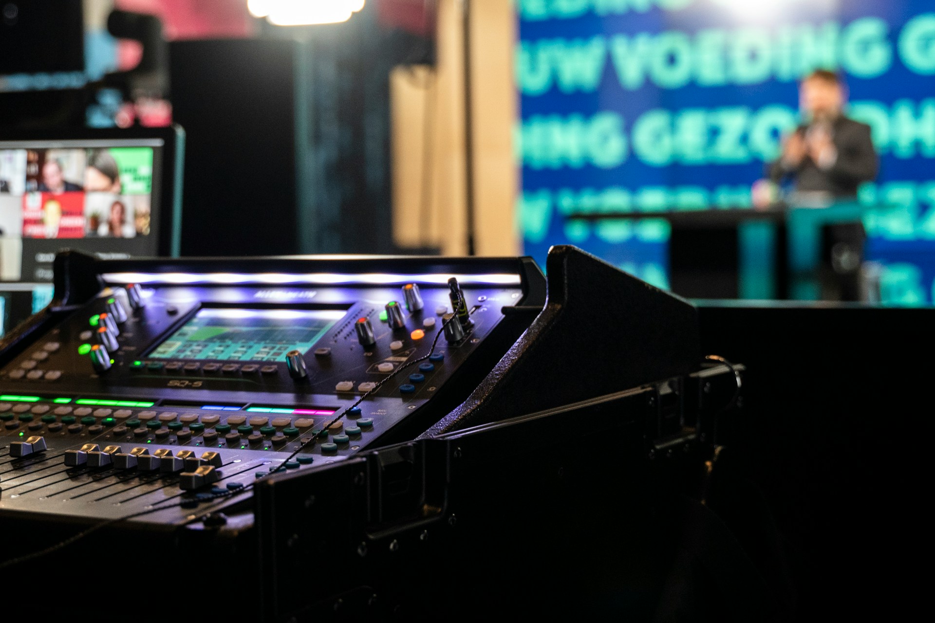 A close up image of a mixer on a studio set