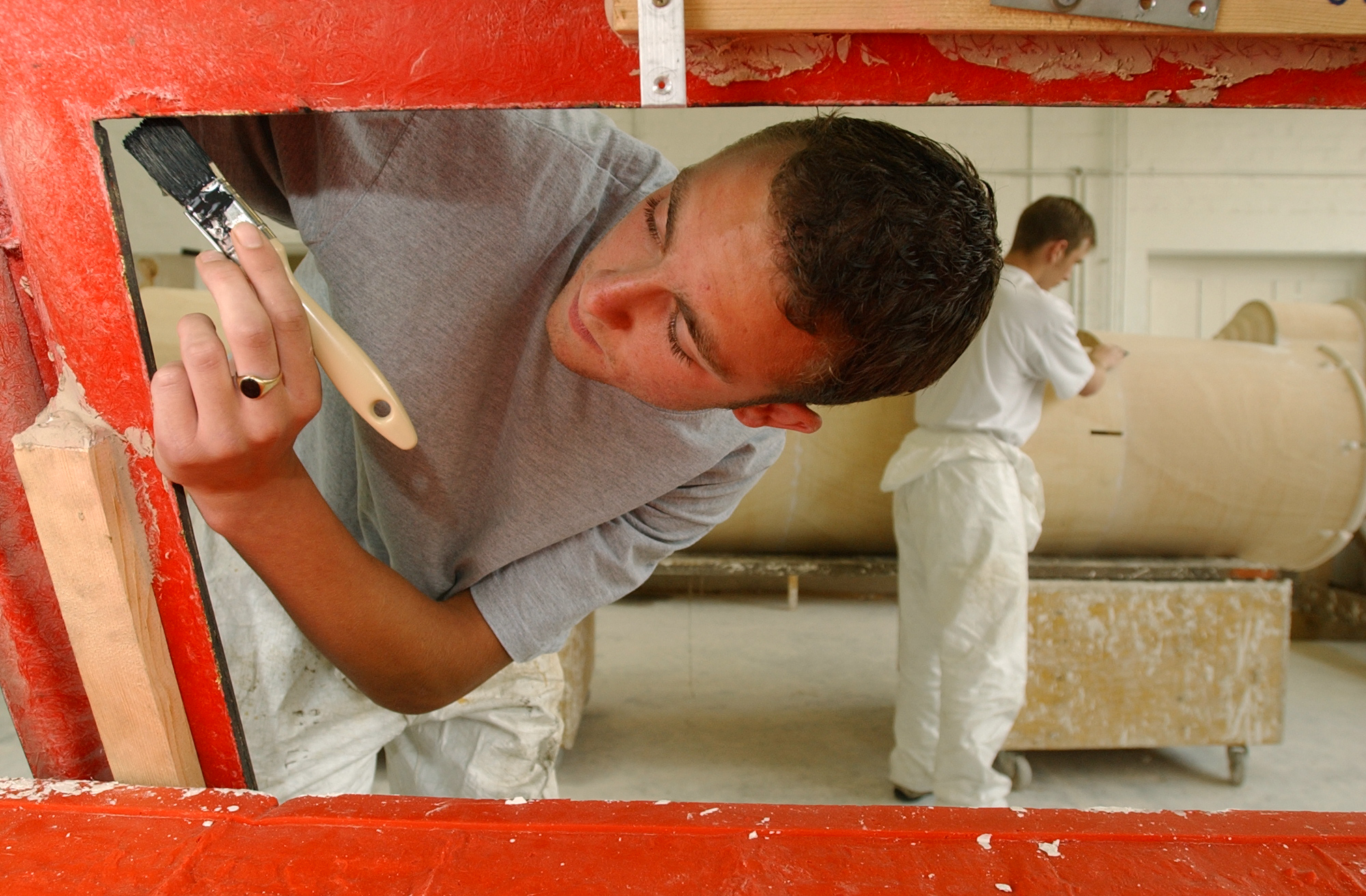 Apprentice painting a piece of set from Harry Potter