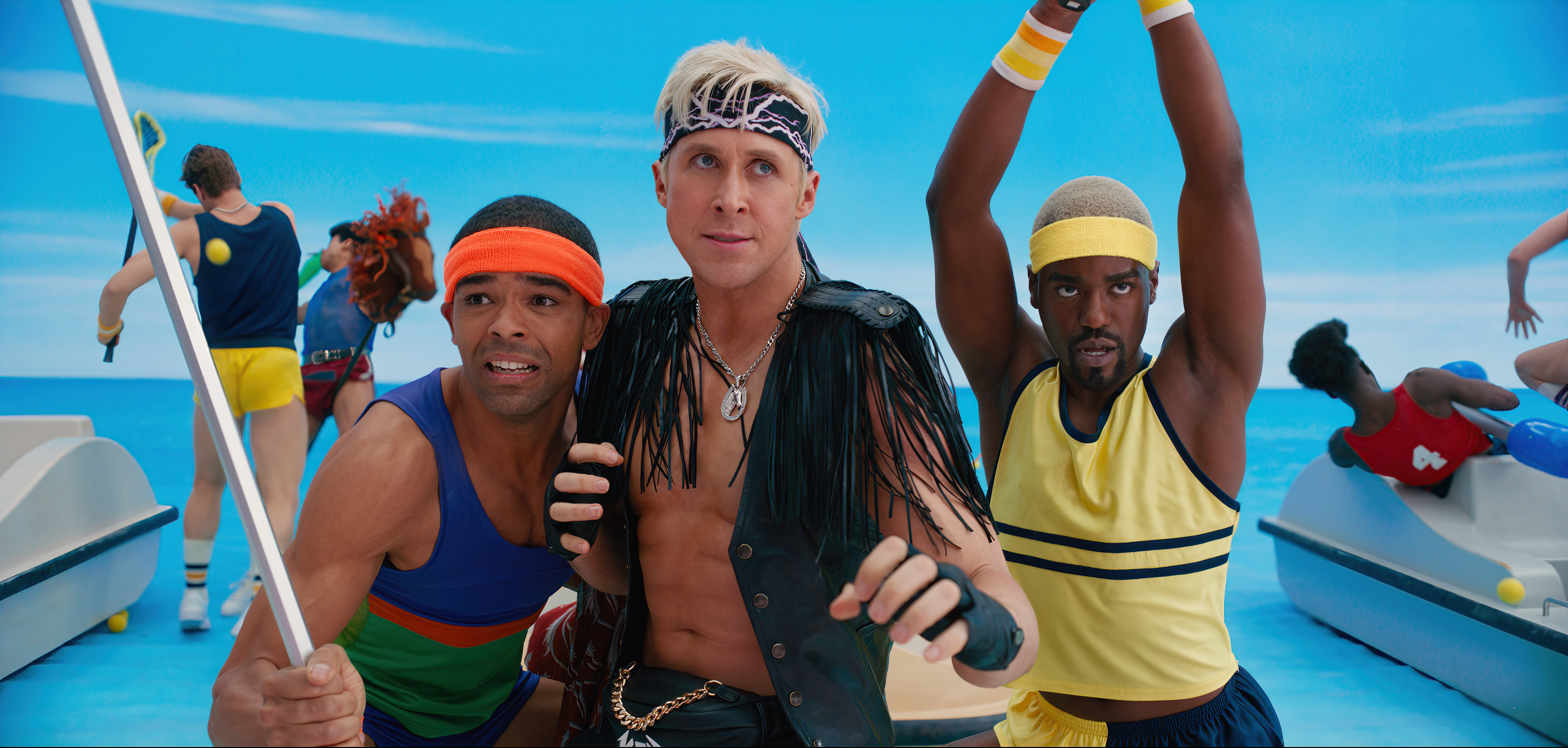 three men in different outfits in fighting position