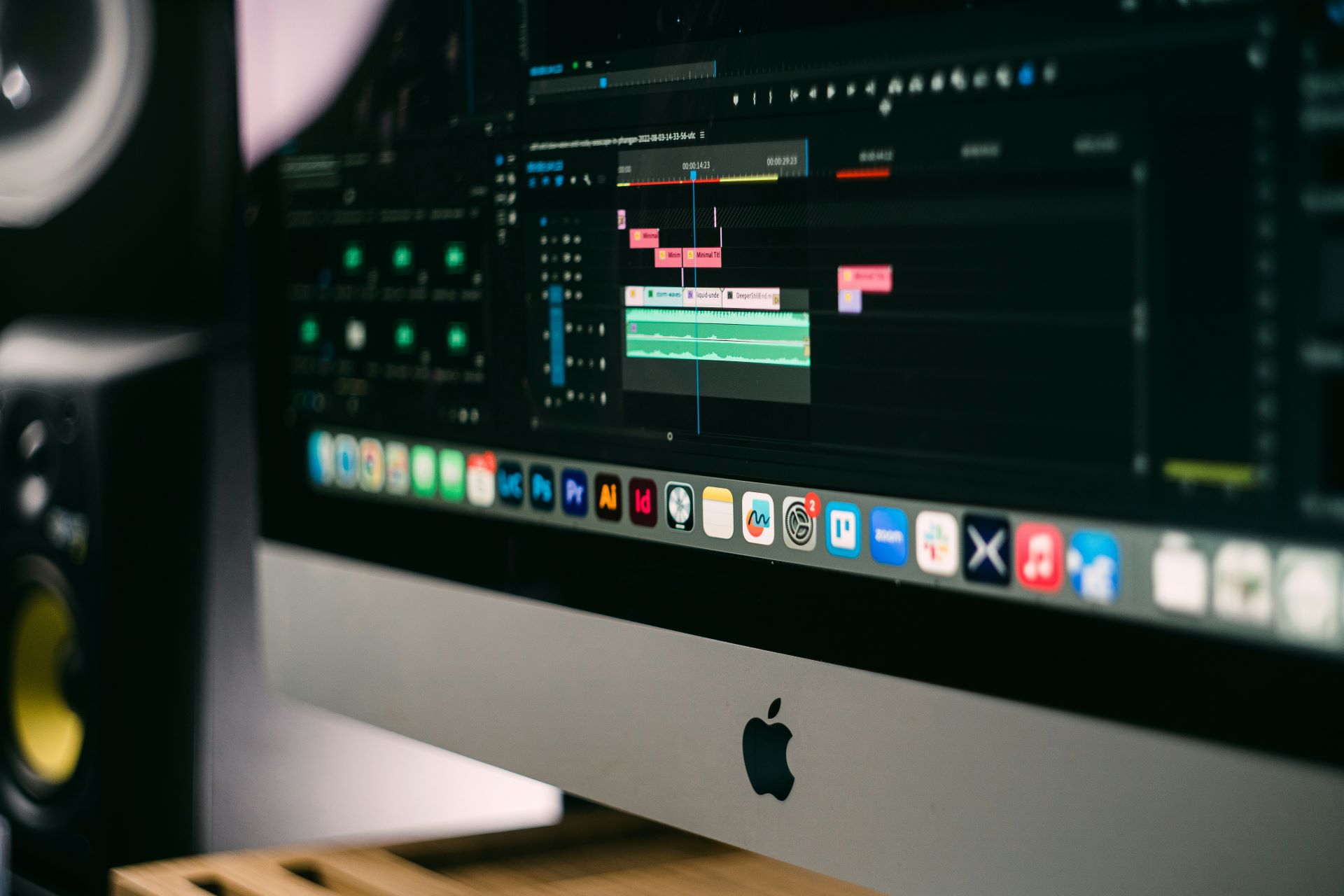 Image of a MacBook computer open to a page of editing software.